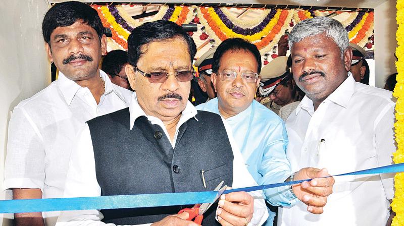 Home Minister Dr G. Parameshwar inaugurates the police station at Begur in Bengaluru on Monday. D.K. Suresh, MP, Councilor Anjanappa and MLA Krishnappa, are seen 	(Photo: DC)