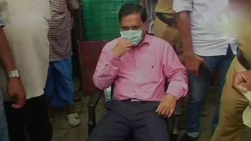 Kochis sub-judge A M Basheer during the sit-in protest. (Photo: ANI | Twitter)