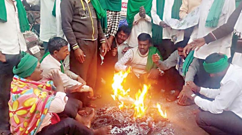 Farmers stage a protest to press for their various demands on Tuesday in Belagavi where the winter  session of the state legislature is now being held