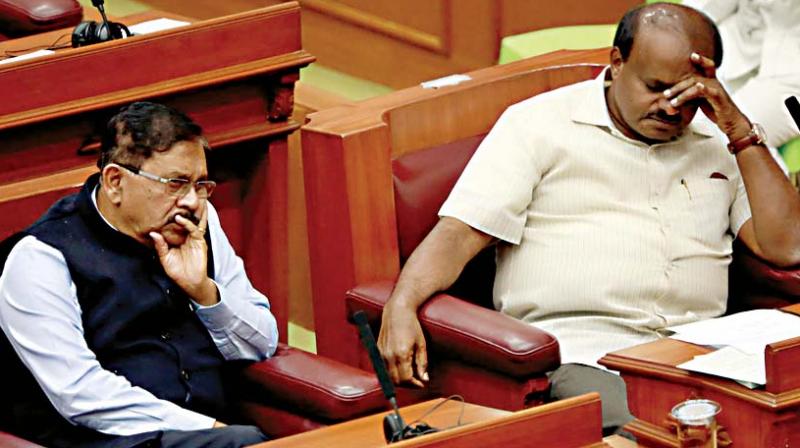 Chief Minister H.D. Kumaraswamy and Deputy CM Dr G. Parameshwar during the winter session of the legislature in Belagavi on Tuesday