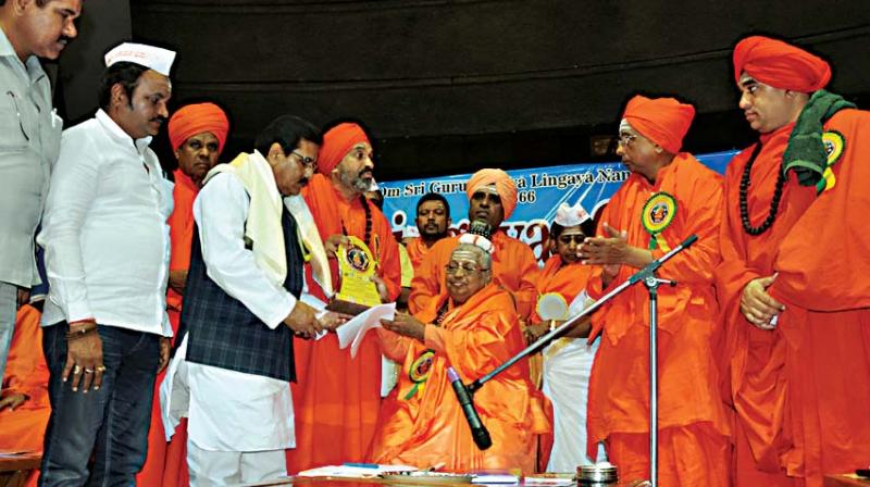 A view of the proceedings at the Lingayat conference held at Talkatora Stadium in New Delhi