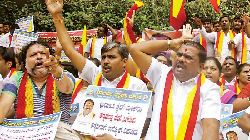 Kannada activists stage a protest against the usage of Hindi in front of the SBI Head Office in Bengaluru on Wednesday 	(Photo:DC)