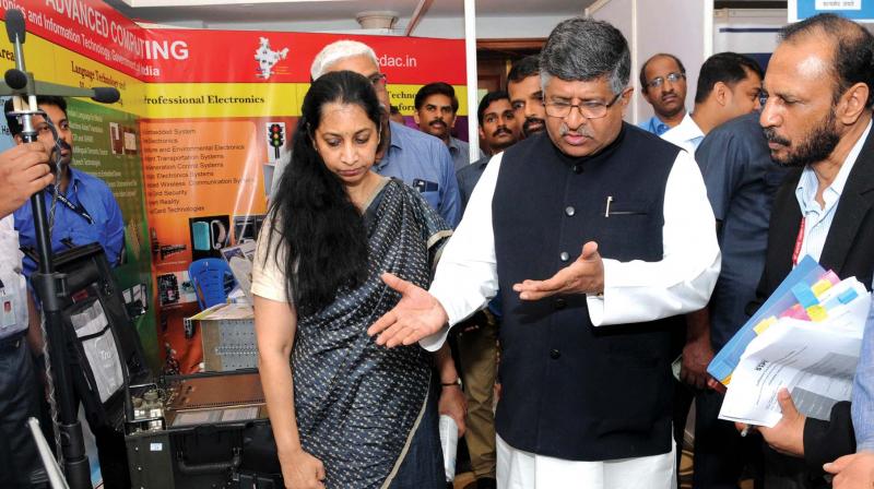 Union Minister for IT and Law Ravi Shanker Prasad along with Aruna Sundararajan, secretary to Ministry of Information Technology, visits digital exhibition stalls by Software Technology Parks of India in Kochi on Sunday.  (Photo: ARUN CHANDRABOSE)