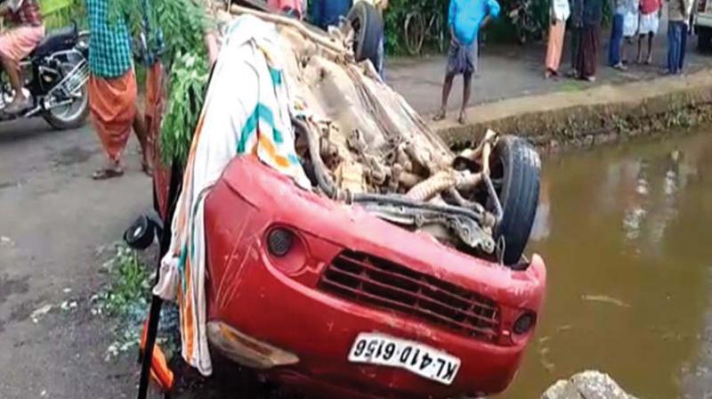 The car that fell into the canal at Kanakkankadavu in Puthenvelikkara on Saturday night.