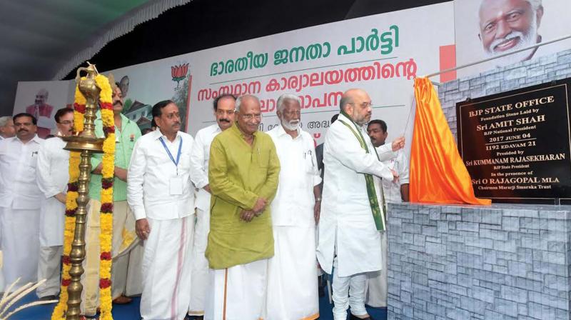 BJP president Amit Shah lays foundation stone for the new party state headquarters in Thiruvananthapuram on Sunday. BJP leader C.K. Padmanabhan, O Rajagopal, MLA, and state president Kummanam Rajasekharan look on. (Photo: DC)