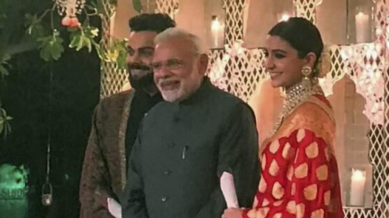 Prime Minister Narendra Modi at the wedding reception of Bollywood actress Anushka Sharma and Indian skipper Virat Kohli. (Photo: PTI)