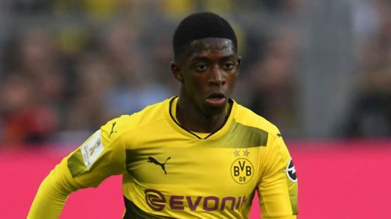 Barcelona is bringing in Dembele to try to boost its attack following the departure of Neymar, who moved to Paris Saint-Germain in a world record transfer worth more than 220 million euros (about $260 million) just before the start of the season.(Photo: AFP)