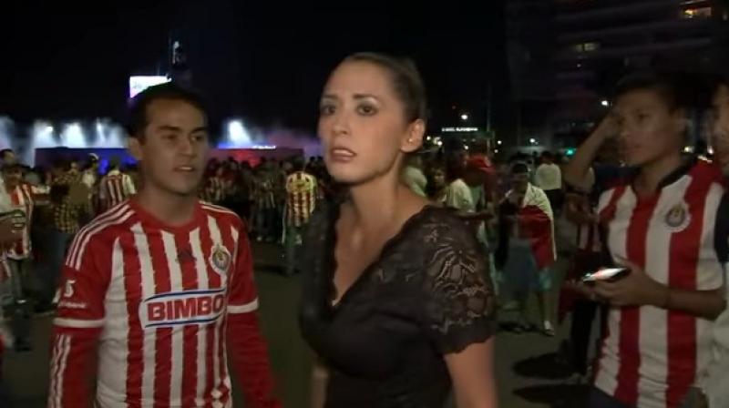 Mexican reporter hits man after being groped live on air. (Photo: Youtube screengrab)
