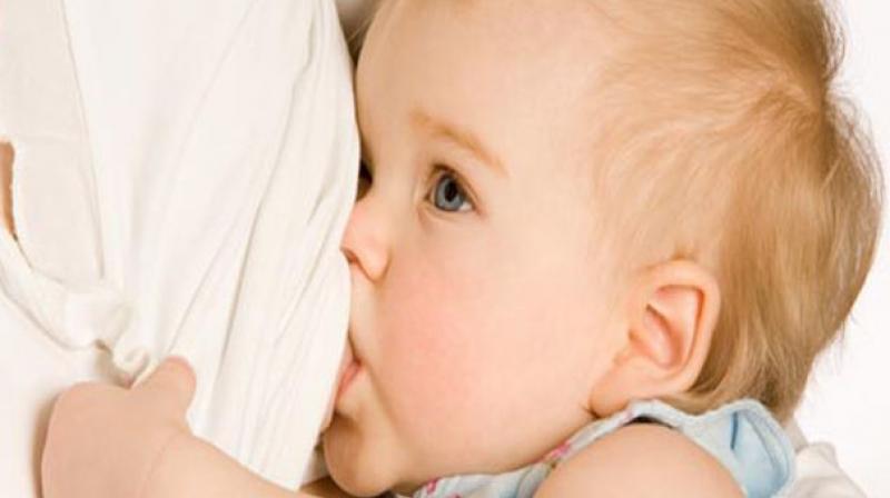 Pediatricians recommend that mothers exclusively breastfeed infants until at least six months of age. (Representational Image)