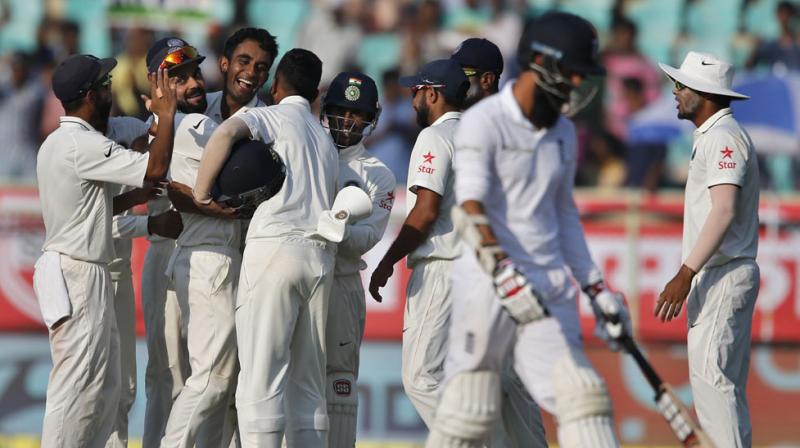 Jayant Yadav dismissed Moeen Ali by trapping him in front of wicket after the English batsman had been down the pitch and was struck on the pad. (Photo: AP)