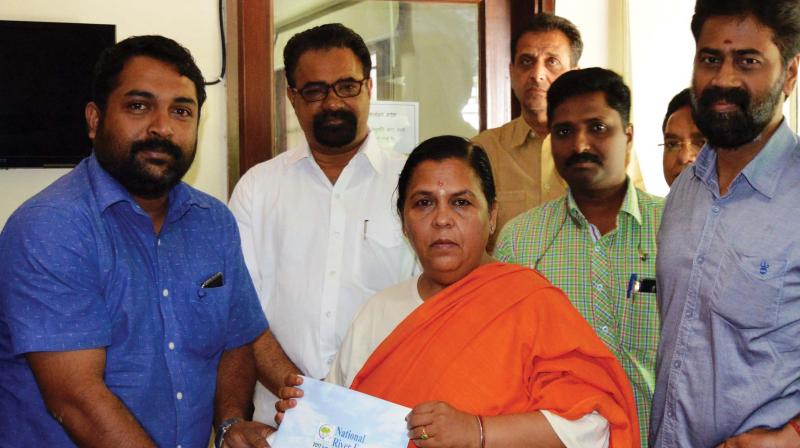 Union minister Uma Bharti releases the brochure of National River Festival in New Delhi.