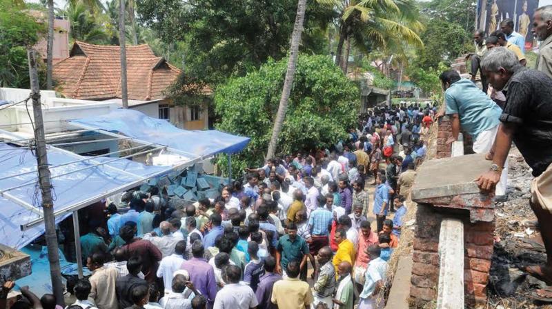 A serpentine queue in front of the liquor outlet of Beverages Corporation at Pettah in Thiruvananthapuram, which is one of the few liquor outlets functioning in the state following the Supreme Court restrictions, on Sunday. (DC FILE)