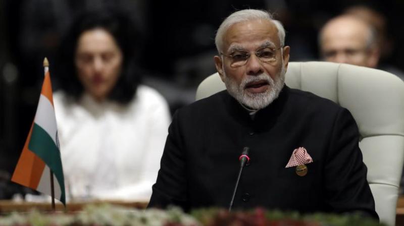 Prime Minister Narendra Modi who arrived in Johannesburg on Wednesday to attend the BRICS Summit called for sharing the best practices and policies in the connection, while adding that technology can help to enhance better service delivery, productivity levels. (Photo: AP)