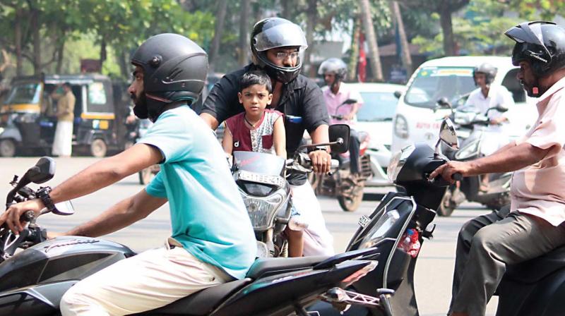 Perplexed riders at Pottammal junction on the Kozhikode-Medical College route