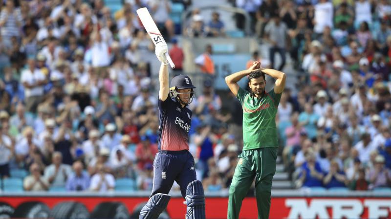 Englands Eoin Morgan celebrates reaching 50 during the ICC Champions Trophy cricket match between England and Bangladesh, at the Oval cricket ground, in London Thursday June 1, 2017. (Photo: AP)