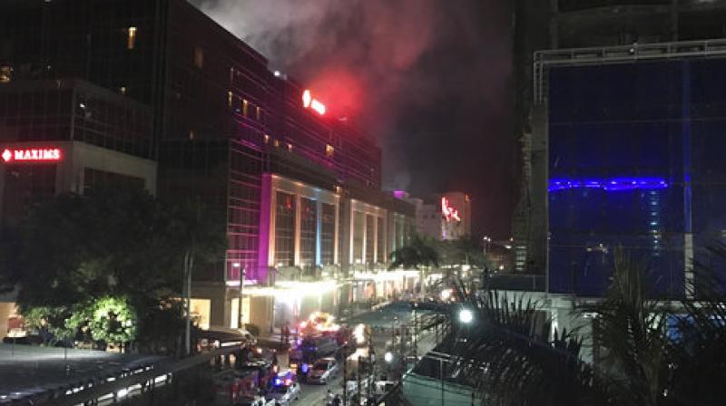 Smoke rises from the Resorts World Manila complex early Friday, June 2, 2017 in Manila, Philippines. Gunshots and explosions rang out early Friday at a mall, casino and hotel complex near Manilas international airport in the Philippine capital, sparking a security alarm amid an ongoing Muslim militant siege in the countrys south. (Photo: AP)