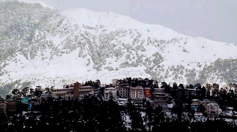 A view of snow covered Naddi Village near Dharamsala. (Photo: PTI)