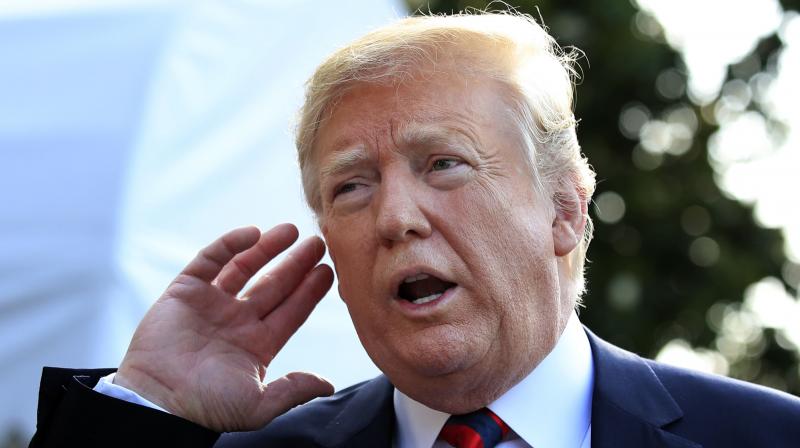 Before leaving to attend the Group of Seven summit in Canada, Trump told reporters he was considering pardoning some 3,000 people, including Ali, who died in 2016. (Photo: AP)