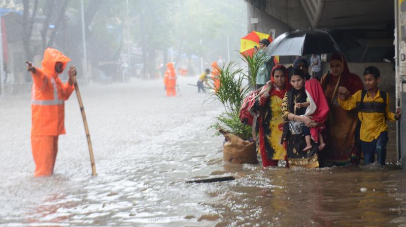 Due to heavy rains in Mumbai, streets are water-logged in several parts of the city. (Photo: Debasish Dey)