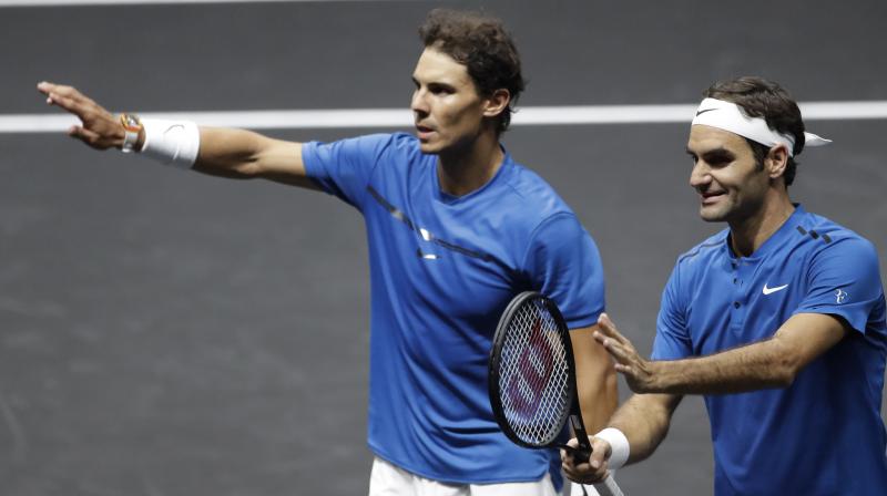 The worlds highest ranking duo  Roger Federer and Rafael Nadal  handed Team Europe, skippered by Bjorn Borg, a 9-3 lead over Team World, captained by John McEnroe, after two days of action in Prague. (Photo: AP)
