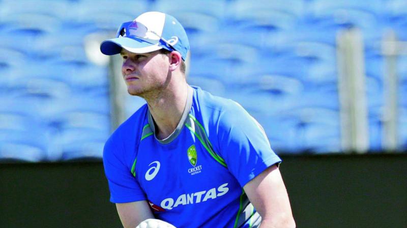 Australia skipper Steve Smith gears up to bat in the nets in Pune on Wednesday. (Photo: AP)