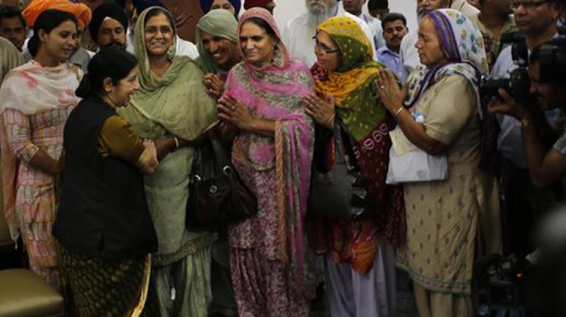 External Affairs Minister Sushma Swaraj, meets family members of missing Indians in Iraqi town of Mosul. (Photo: AP)