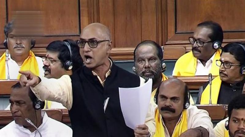 TDP MP Jayadev Galla speaks in the Lok Sabha on no-confidence motion during the Monsoon session of Parliament, in New Delhi. (LSTV GRAB via PTI)