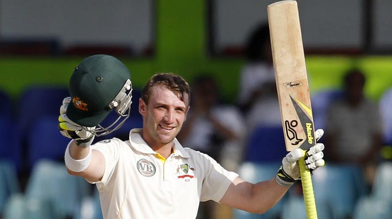 The late Phil Hughes memory lives on in the Australian dressing room with a gold blazer bearing his Test cap number being the top prize for the player voted man of the match by teammates, spinner Nathan Lyon has revealed. (Photo: AP)