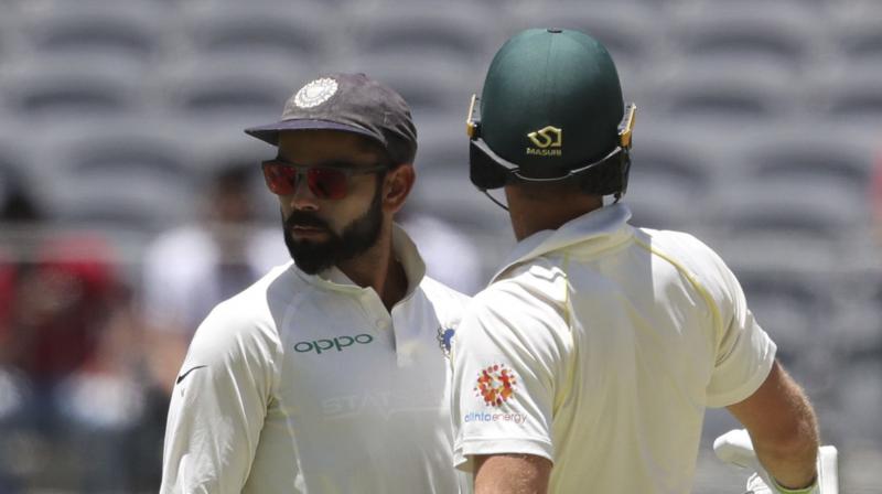 Virat Kohli and Austrlian skipper Tim Paine exchanged barbs, at one point prompting intervention from the umpire, during the Perth Test that Australia won by 146 runs on Tuesday to level the four-match series 1-1. (Photo: AP)