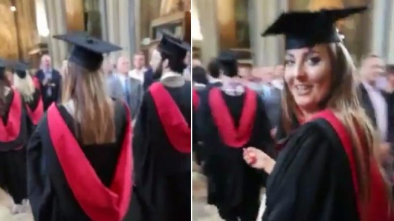 Girl spots father filming wrong girl at her graduation. (Photo: Twitter / Georgia Wilde)