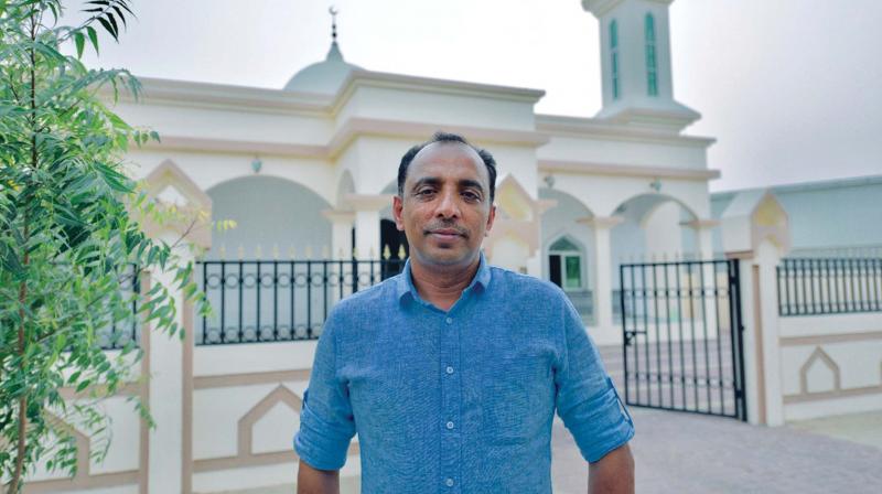 Saji Cherian before the Mosque of Mariam Umm Eisa in Fujairah.