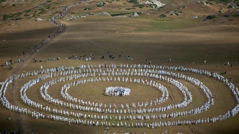 Members of an international religious movement called the Universal White Brotherhood perform a ritual dance on Bulgarias Rila mountain.(Photo: AFP)