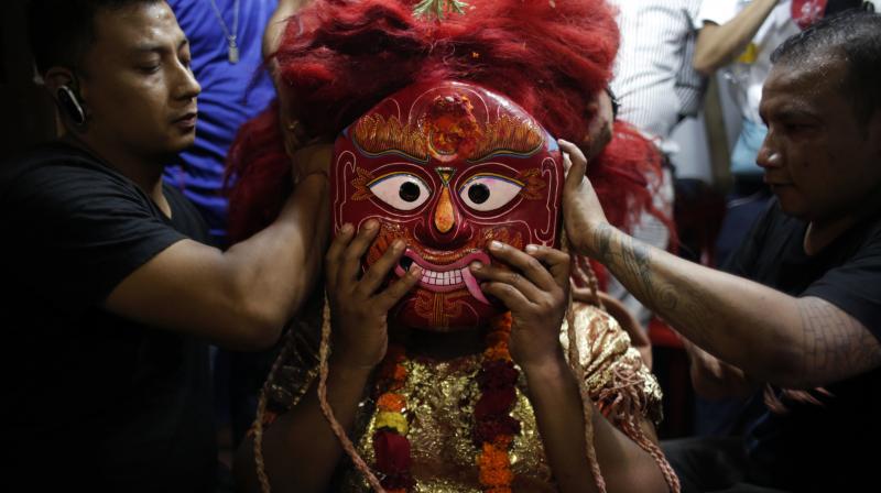 Devotees worship the King of Gods in Indra Jatra Festival in Nepal