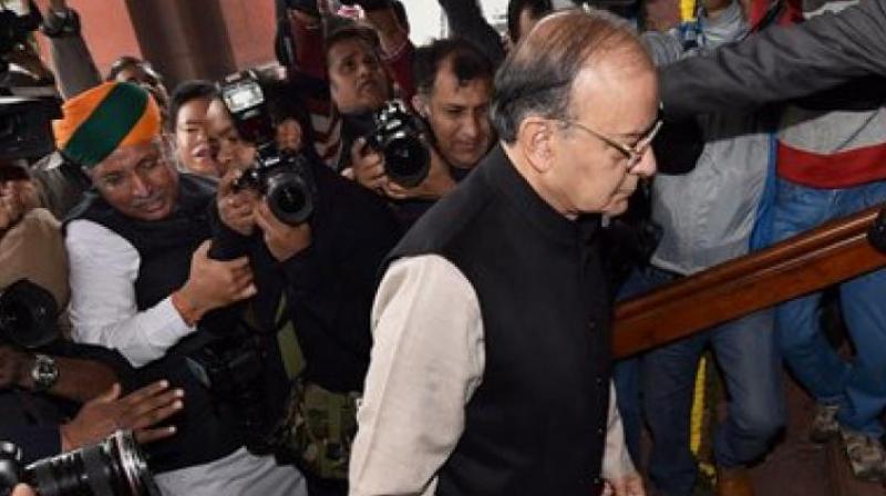 Finance Minister Arun Jaitley arrives in Parliament to present the Union budget for 2017-18. (Photo: AP)