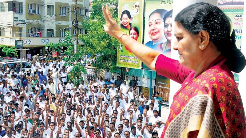 AIADMK general secretary V.K. Sasikala greets the party workers at the AIADMK  headquarters on Wednesday. (Photo: N. Sampath)