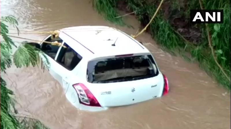 The car was found half a km away downstream. Bodies have been sent for autopsy, police said. (Photo: ANI/Twitter)