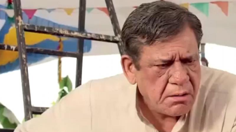 Om Puri in a still from the film.