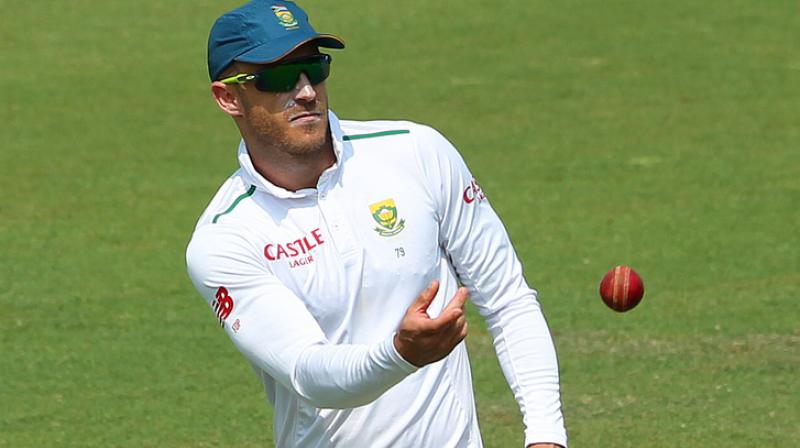 Faf du Plessis was charged after television footage appeared to show him applying an artificial substance to the ball during the fourth days play in the second Test against Australia in Hobart. (Photo: BCCI)