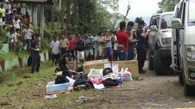 Dimaukom and the nine others were killed at dawn Friday after they opened fire from a van and an SUV on officers manning a checkpoint in Makilala town in North Cotabato province, police said. (Photo