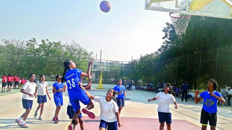 Harshitha of DPS Hyderabad is airborne as she makes a successful attempt in their match against HPS Begumpet.