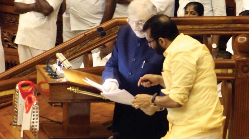 Governor P Sathasivam asks Speaker P Sreeramakrishnan how to spell Kinanthropometry during the governors address on Friday.