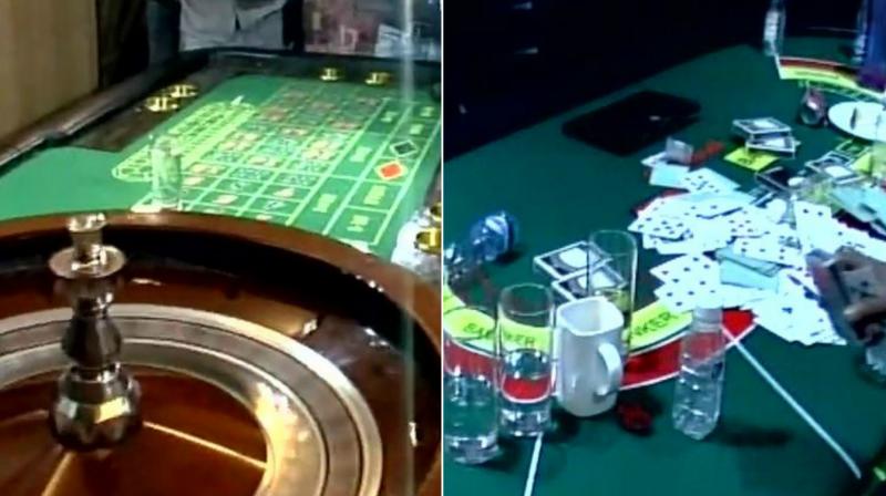 Delhi police on Monday raided an illegal casino in the Sainik Farm area of the national capital and arrested 36 persons. (Photos: ANI/Twitter)