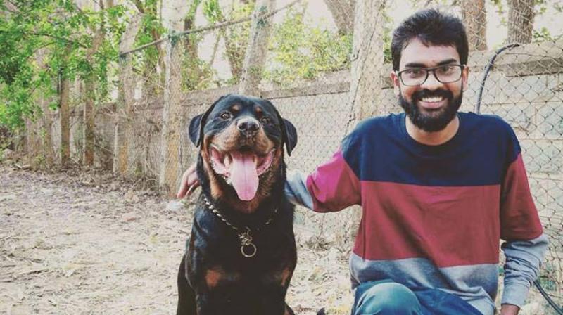 Vivek Anand with a Rottweiler.