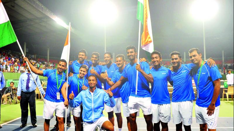 The Indian team celebrate their 3-0 win over Uzbekistan in their Davis Cup Group I Round Two tie in Bengaluru on Saturday. (Photo: SHASHIDHAR B)