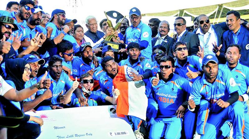 The Indian mens blind cricket team celebrate winning the T20 World Cup after beating Pakistan in the final at Bengaluru on Sunday (Photo: B. SHASHIDHAR)