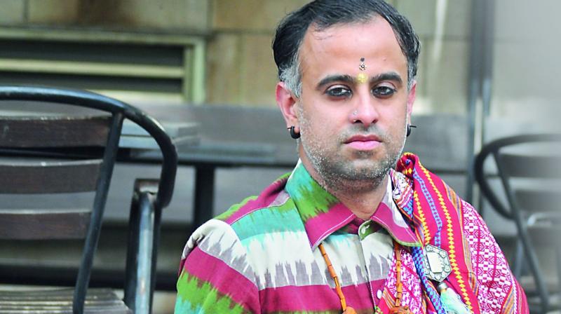 Himanshu Verma wears saris in an androgynous manner