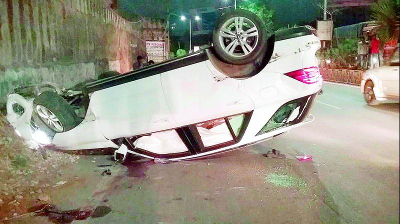 The car in which Rahul and Sai Charan were travelling turned turtle after hitting a pole (Photo: DC)