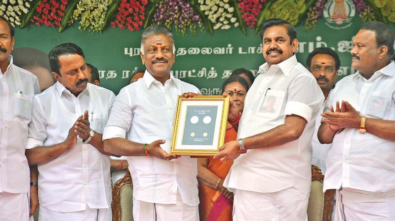 Chief Minister Edappadi K. Palaniswami along with Deputy CM O. Panneerselvam releases commemorative coins on the birth centenary of MGR. (Photo: DC)
