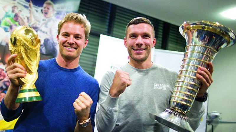 Nico Rosberg, who was recently crowned Formula One champion, and Lukas Podolski, who was part of Joachim Lows World Cup-winning squad in 2014.