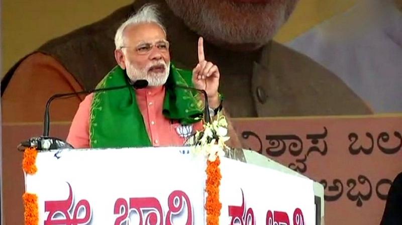 Prime Minister Narendra Modi addressed the farmers of Karnataka at a rally in Davanagere, Karnataka on Tuesday. (Photo: Twitter | ANI)